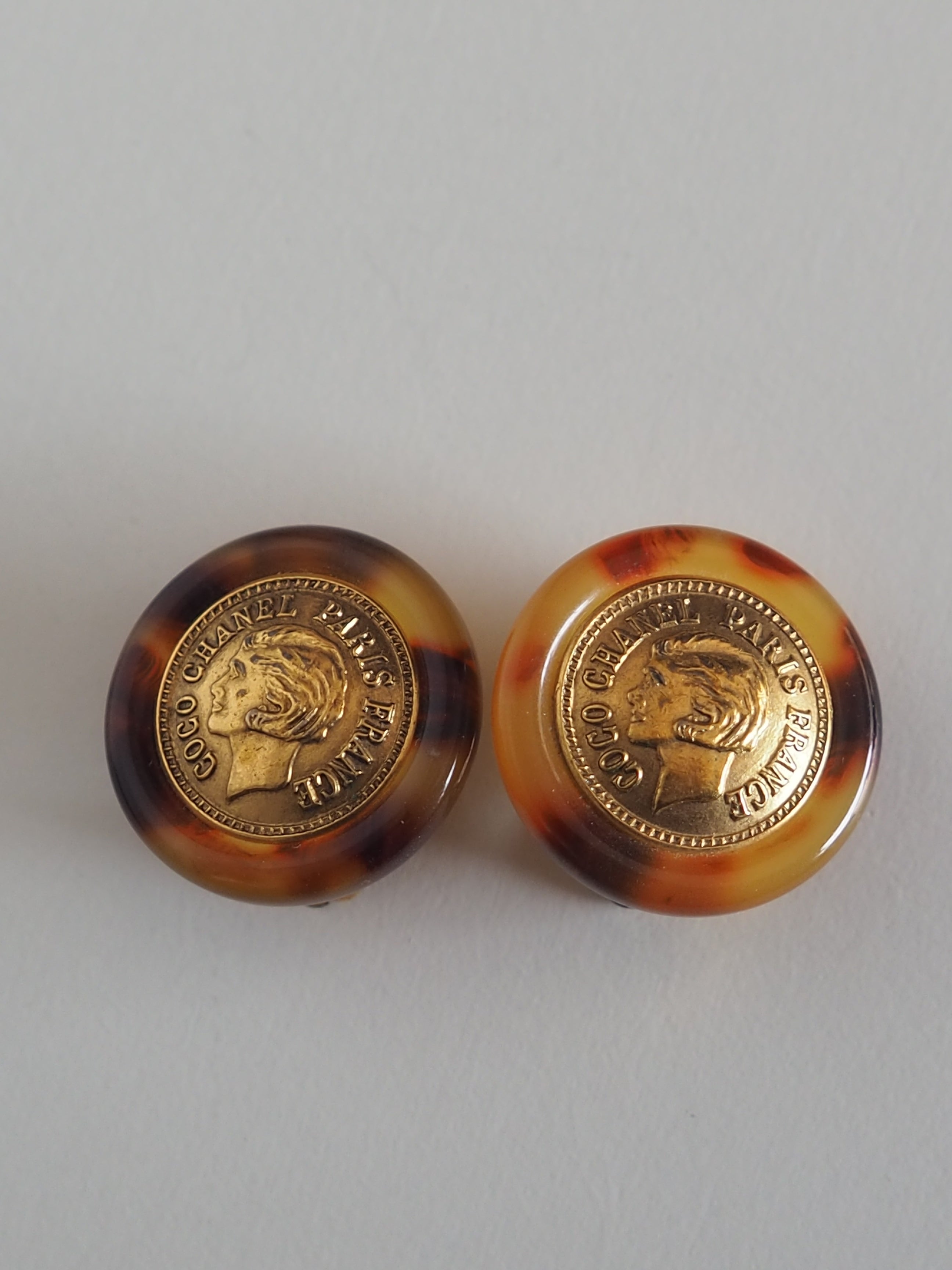 CHANEL Tortoise Shell Coin Earrings