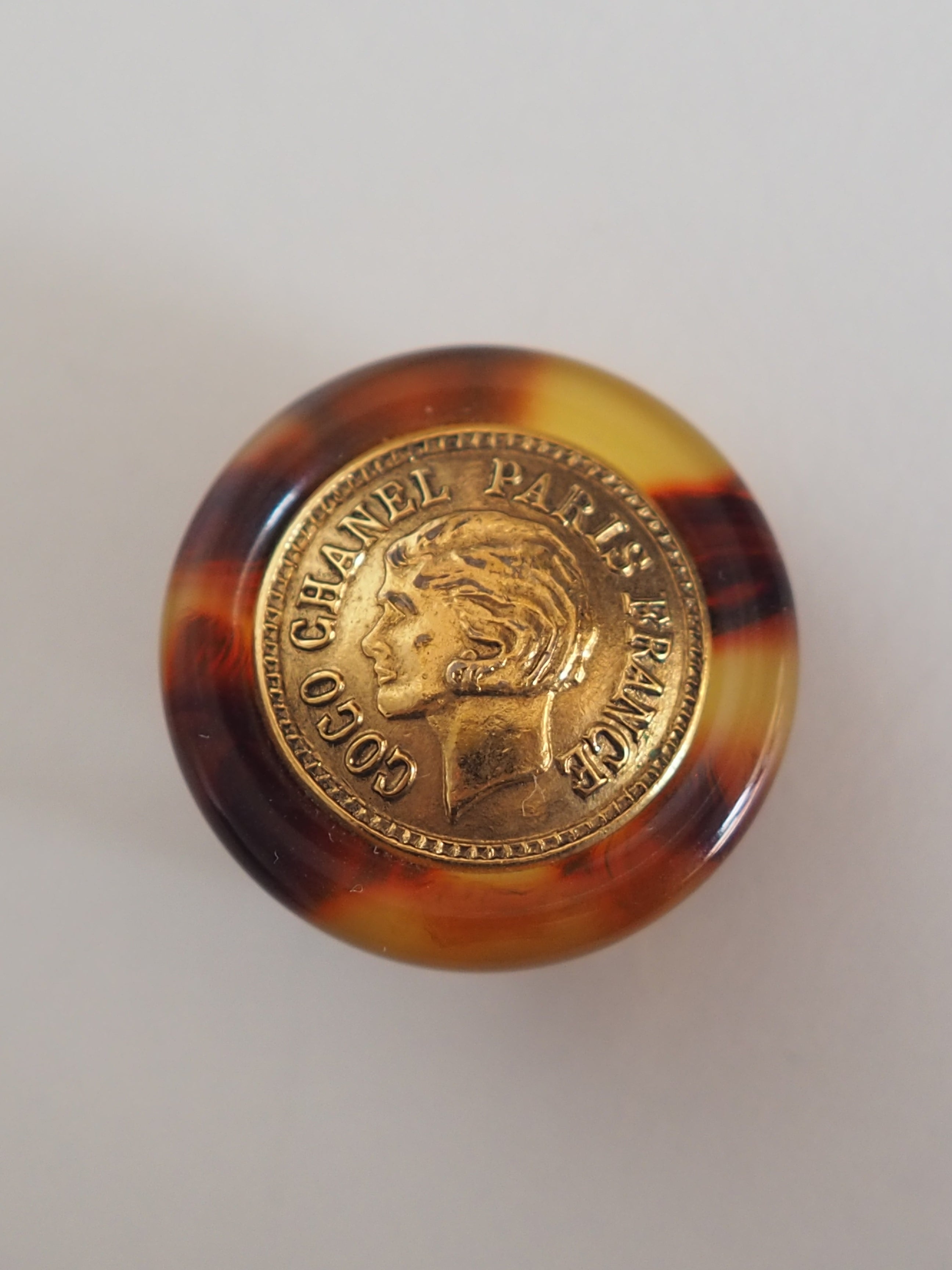 CHANEL Tortoise Shell Coin Earrings