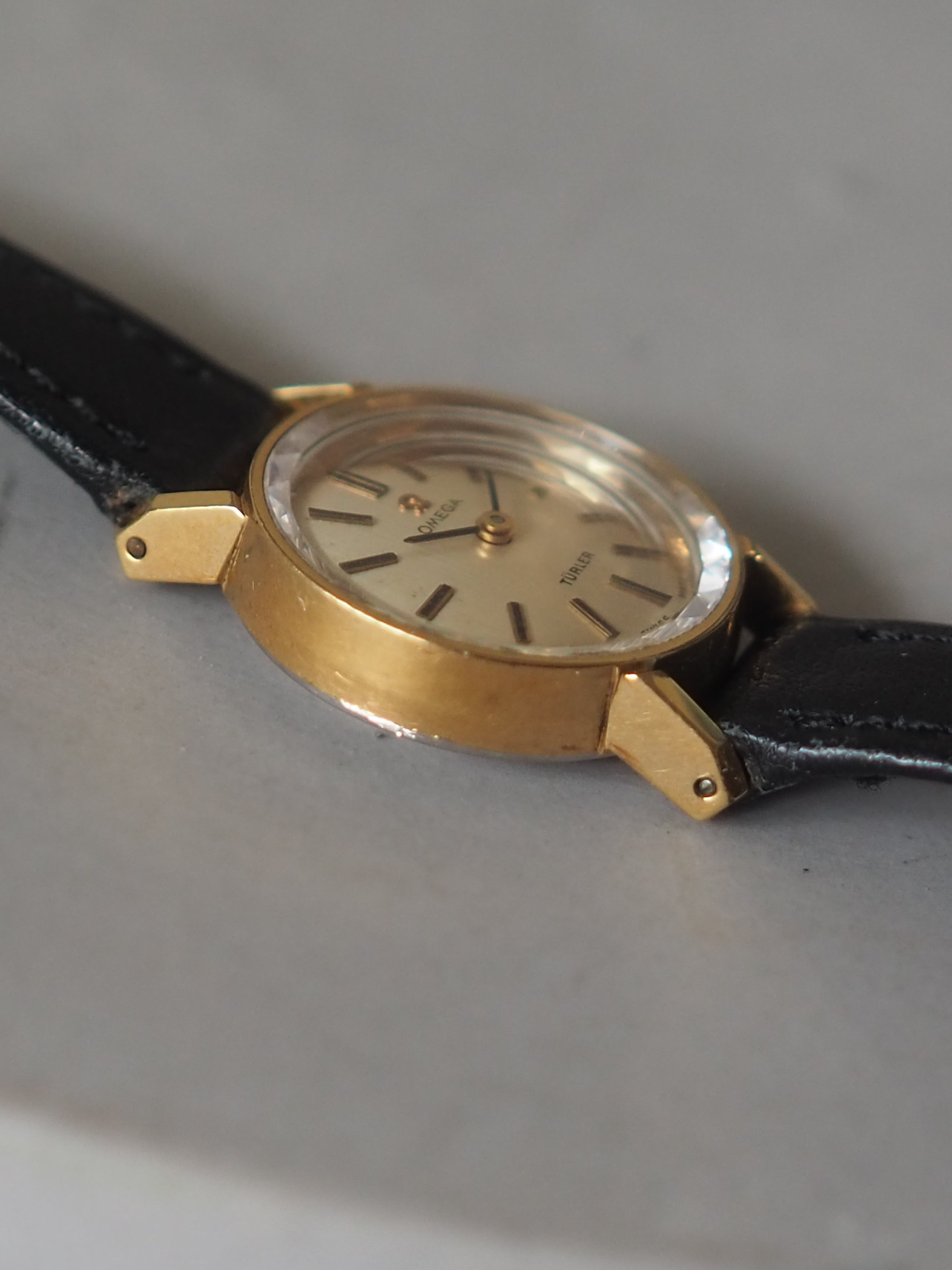 OMEGA TÜRLER Cut Glass Watch