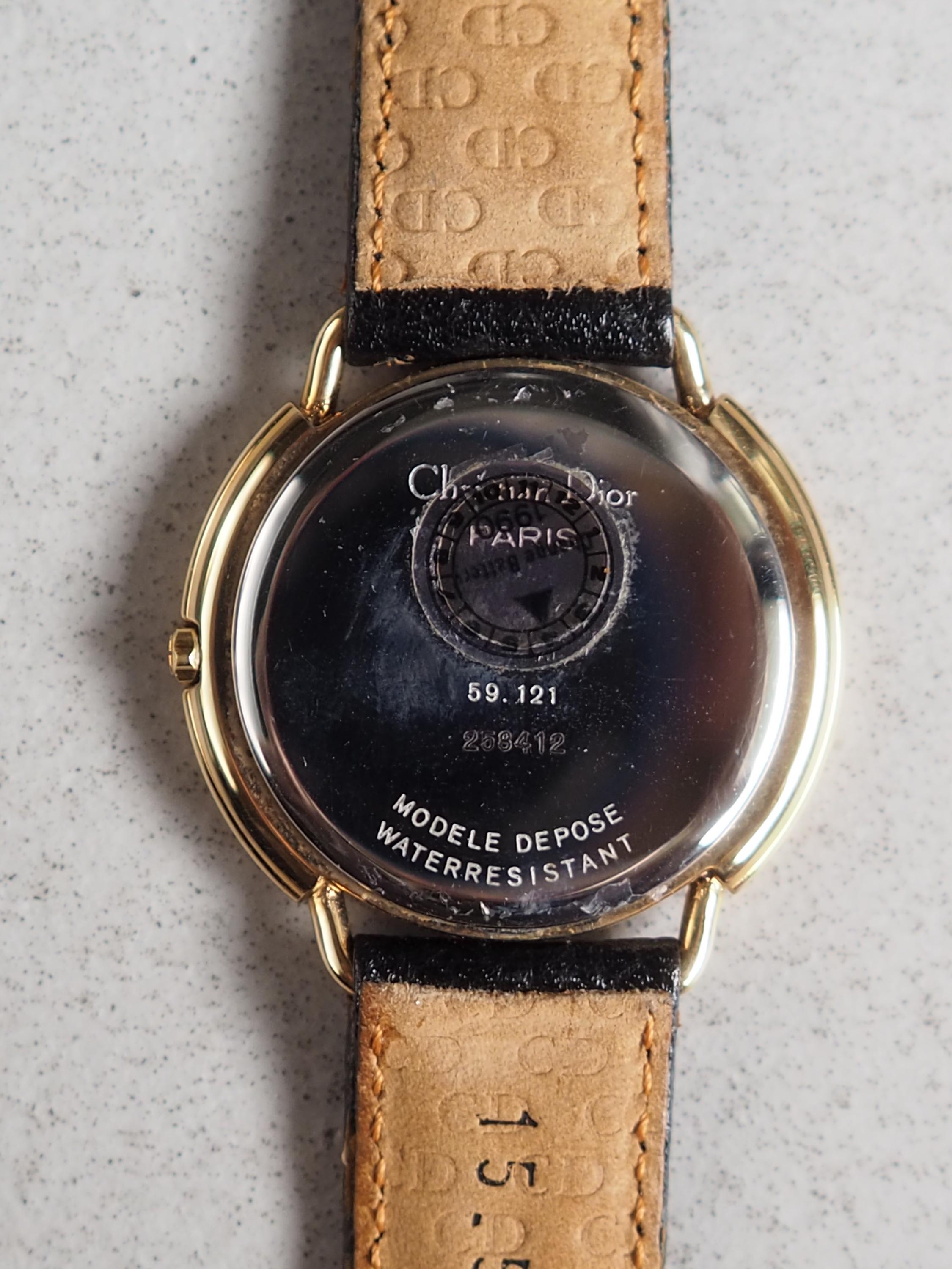 Christian Dior Round Logos Watch Gold Metal Leather Quartz Wristwatch Unisex Vintage Authentic