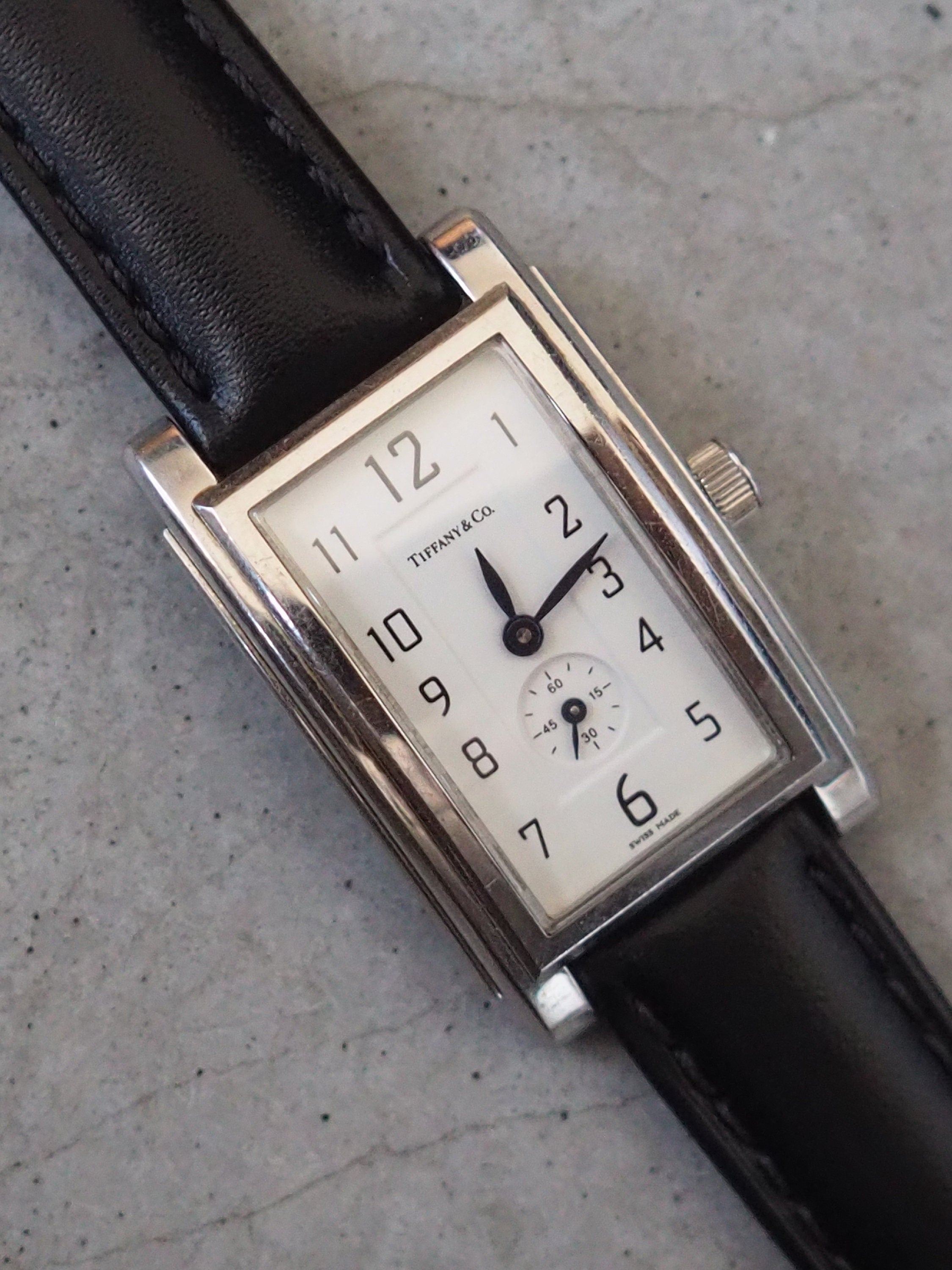 Tiffany & Co Grand Watch Silver Metal Black Leather Stainless Steel Quartz Wristwatch Ladies