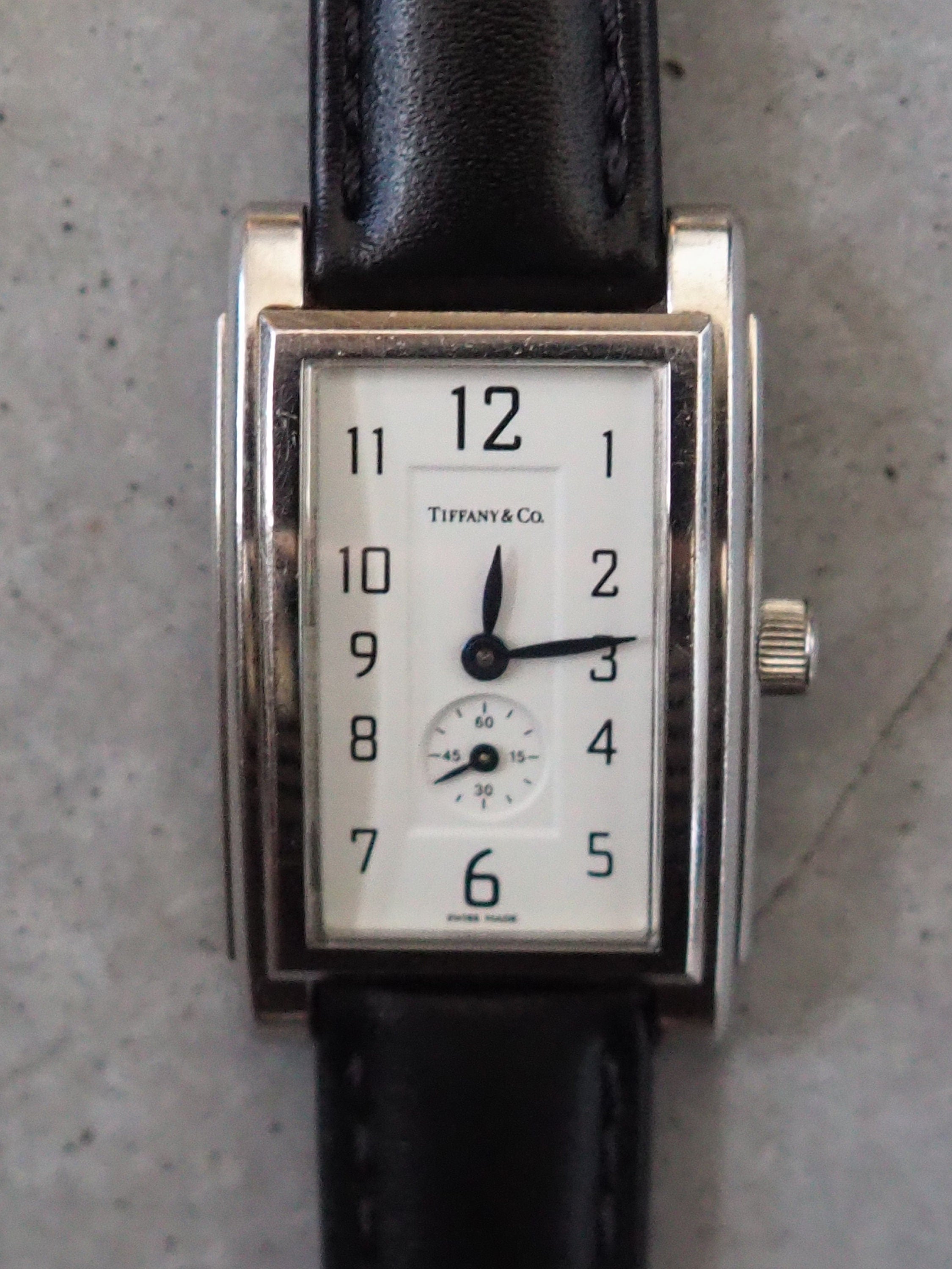 Tiffany & Co Grand Watch Silver Metal Black Leather Stainless Steel Quartz Wristwatch Ladies