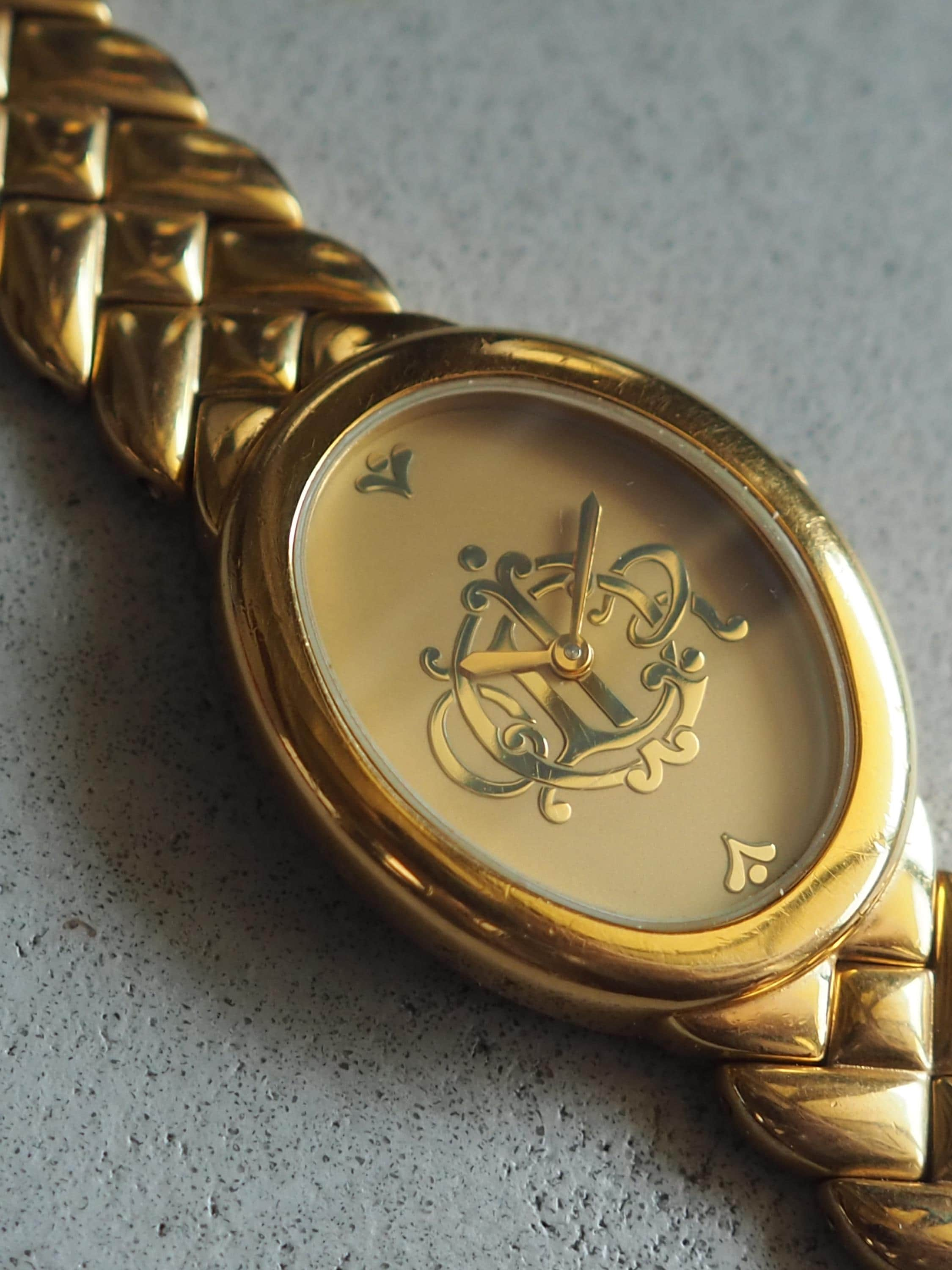 Christian Dior Emblem Logo Watch Gold Metal Quartz Wristwatch Ladies Vintage Authentic