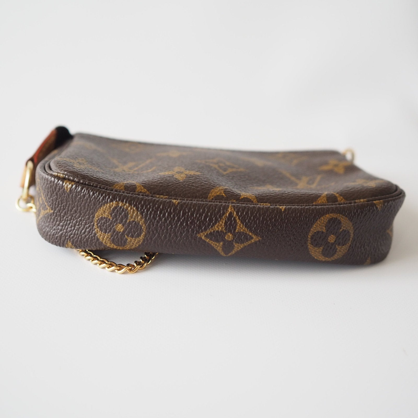 Louis Vuitton  Monogram mini Pouch Limited  Vintage With  Strap Authentic